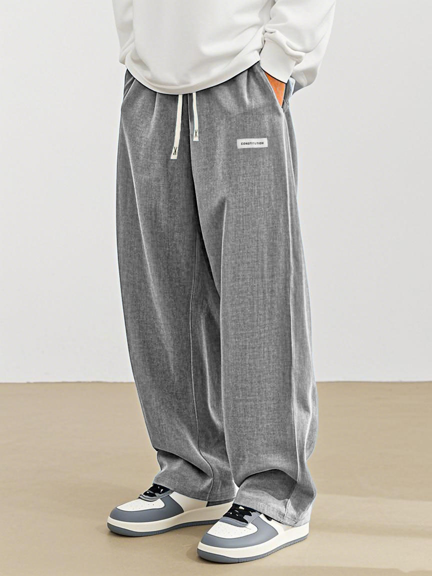 Men's Fashion Casual Everyday Hemp Fabric Pocket Embroidered Logo Loose Trousers 