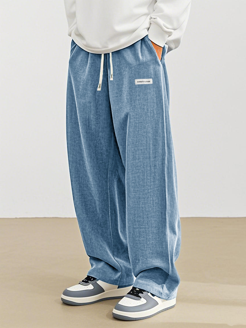 Men's Fashion Casual Everyday Hemp Fabric Pocket Embroidered Logo Loose Trousers 