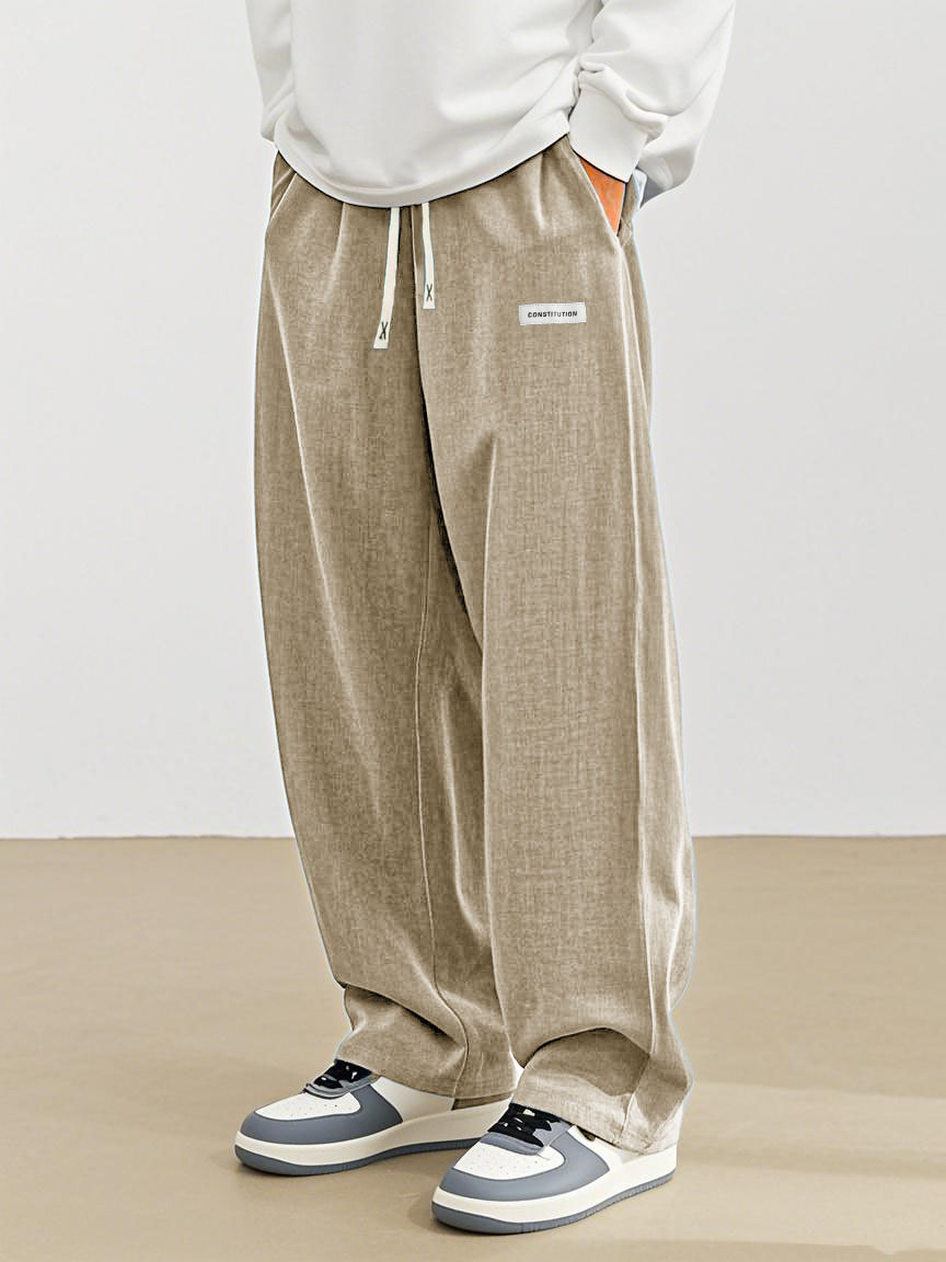 Men's Fashion Casual Everyday Hemp Fabric Pocket Embroidered Logo Loose Trousers 