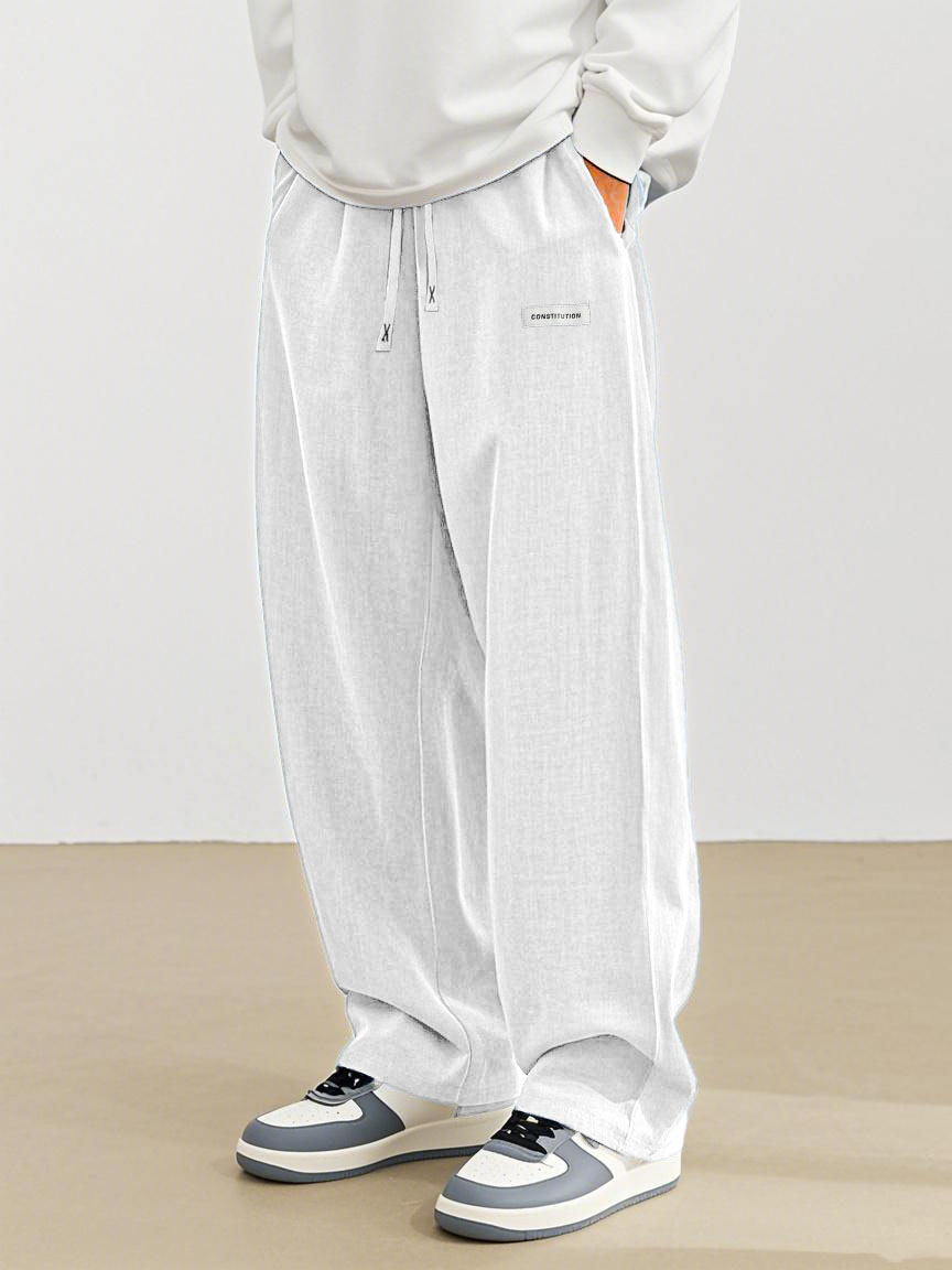 Men's Fashion Casual Everyday Hemp Fabric Pocket Embroidered Logo Loose Trousers 